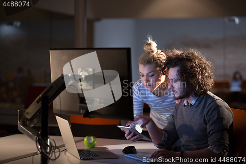 Image of young designers in the night office