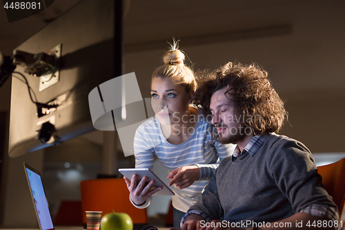 Image of young designers in the night office