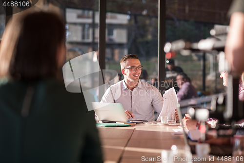 Image of Business Team At A Meeting at modern office building