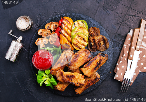 Image of grilled vegetables and ribs