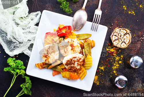 Image of baked vegetables with cutlet