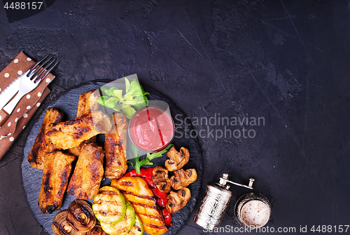 Image of grilled vegetables and ribs