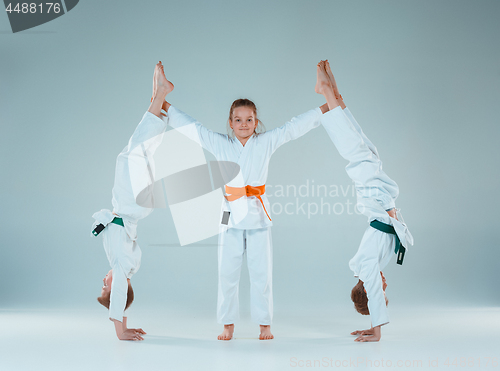 Image of The boys fighting at Aikido training in martial arts school. Healthy lifestyle and sports concept