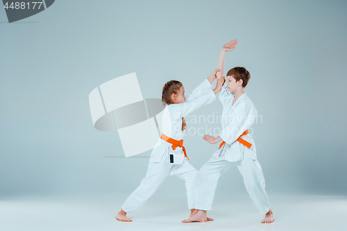 Image of The boy fighting at Aikido training in martial arts school. Healthy lifestyle and sports concept