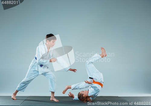 Image of The boy fighting at Aikido training in martial arts school. Healthy lifestyle and sports concept
