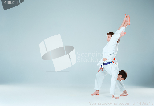 Image of The boys posing at Aikido training in martial arts school. Healthy lifestyle and sports concept