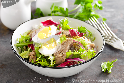 Image of Tuna salad in bowl. Mediterranean food. Fresh salad with canned tuna fish. Healthy diet food