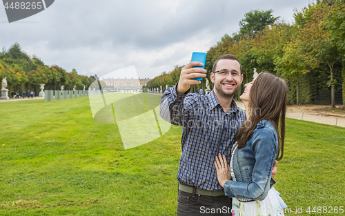 Image of Coupe Taking a Selfie