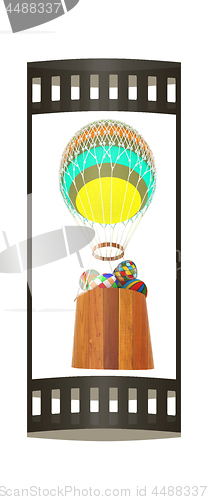 Image of Hot Colored Air Balloon with a basket and Easter eggs inside. 3d