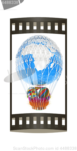 Image of Hot Air Balloon of Earth with a basket of multicolored wheat and