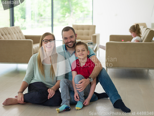 Image of family with little boy enjoys in the modern living room