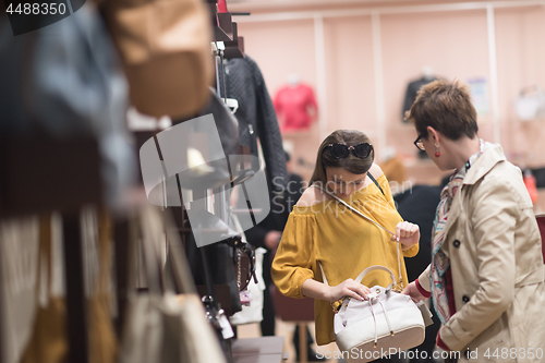 Image of best friend shopping in big mall