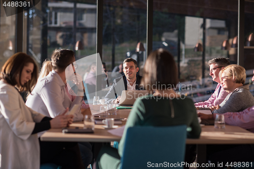Image of Business Team At A Meeting at modern office building