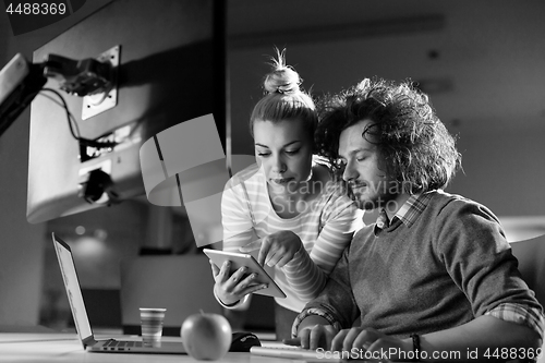 Image of young designers in the night office