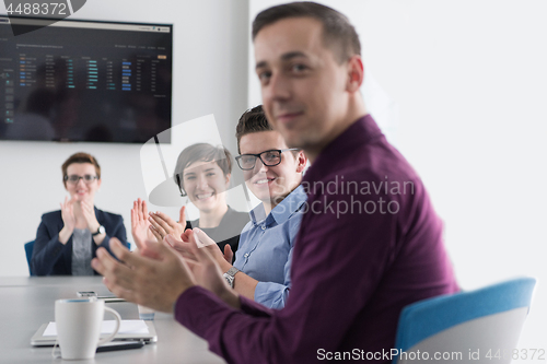 Image of Group of young people meeting in startup office