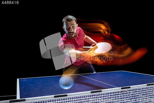 Image of The table tennis player serving