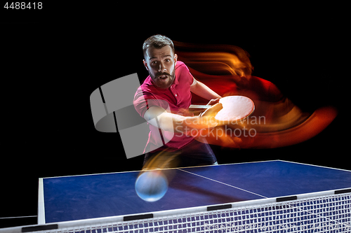 Image of The table tennis player serving