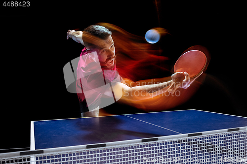 Image of The table tennis player serving