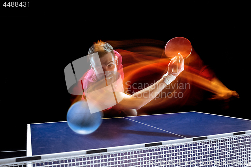 Image of The table tennis player serving