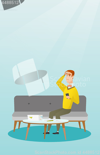 Image of Unhappy caucasian man accounting home bills.