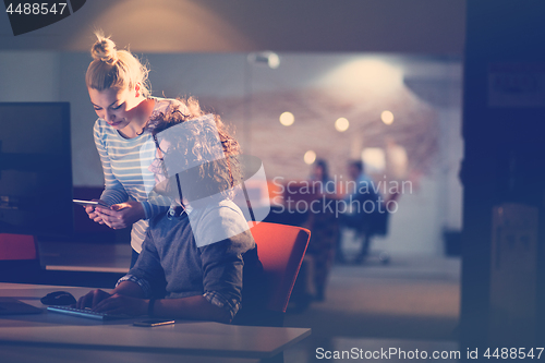 Image of young designers in the night office