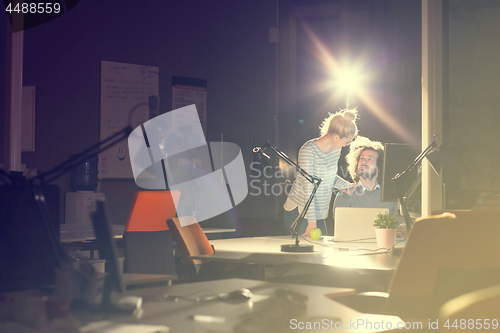 Image of young designers in the night office