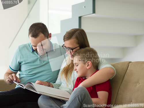 Image of family with little boy enjoys in the modern living room