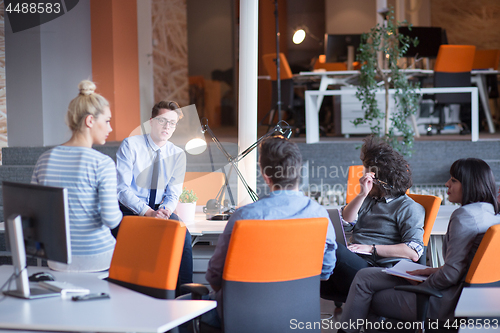 Image of Young Business Team At A Meeting at modern office building