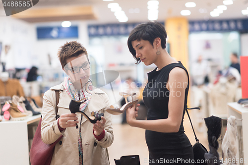 Image of best friend shopping in big mall