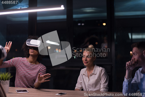 Image of Multiethnic Business team using virtual reality headset