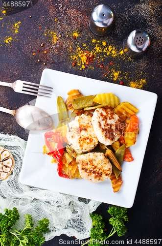 Image of baked vegetables with cutlet