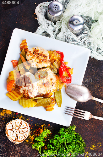 Image of baked vegetables with cutlet