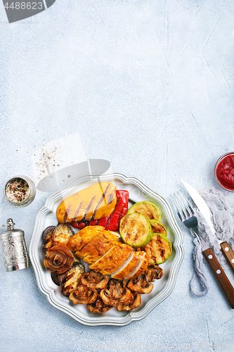 Image of chicken barbecue and grilled vegetables