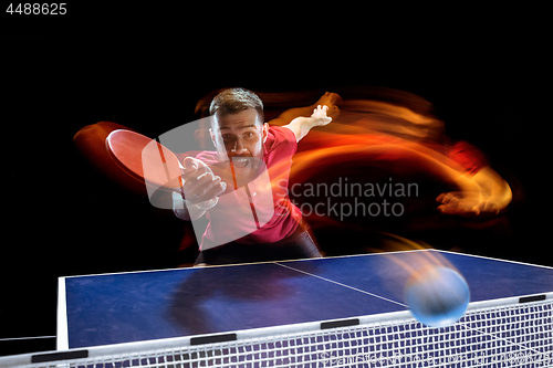 Image of The table tennis player serving