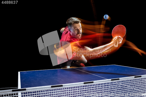 Image of The table tennis player serving