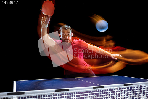 Image of The table tennis player serving