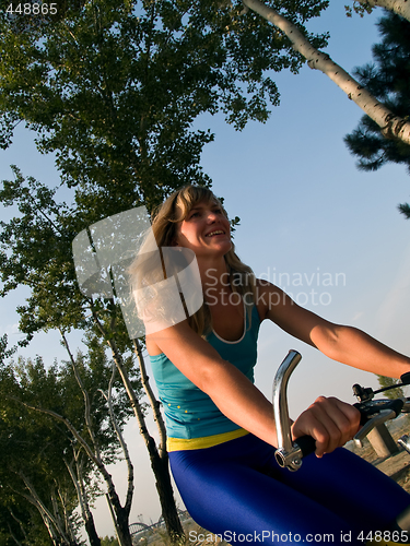 Image of Happy girl on bicycle
