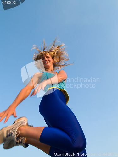 Image of Jumping sporty girl