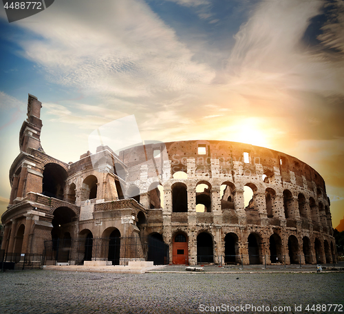 Image of Bright sun and Colosseum