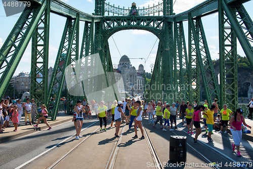 Image of People dancing on Liberty bridge
