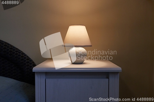 Image of Lamp on a nightstand