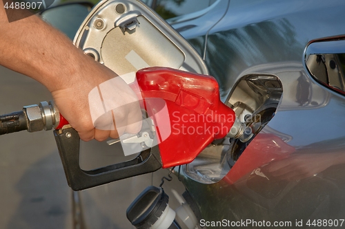 Image of Fuel Nozzle Filling Car