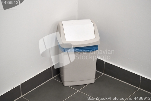 Image of Dustbin in a public corridor corner