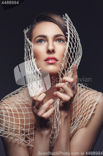 Image of Beautiful girl with net