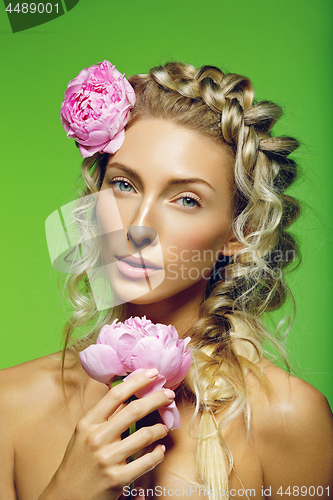 Image of Beautiful girl with peony flower