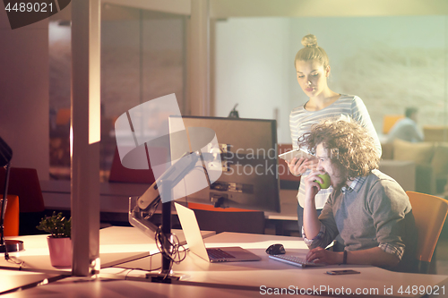 Image of young designers in the night office