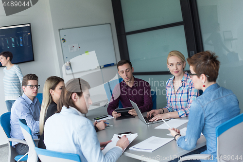 Image of Business Team At A Meeting at modern office building