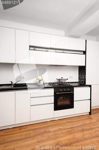 Image of Modern classic black and white kitchen