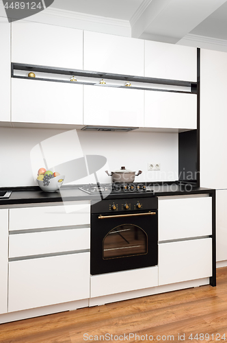 Image of Modern classic black and white kitchen