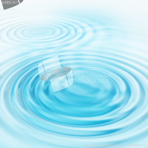 Image of Abstract blue circular water ripples